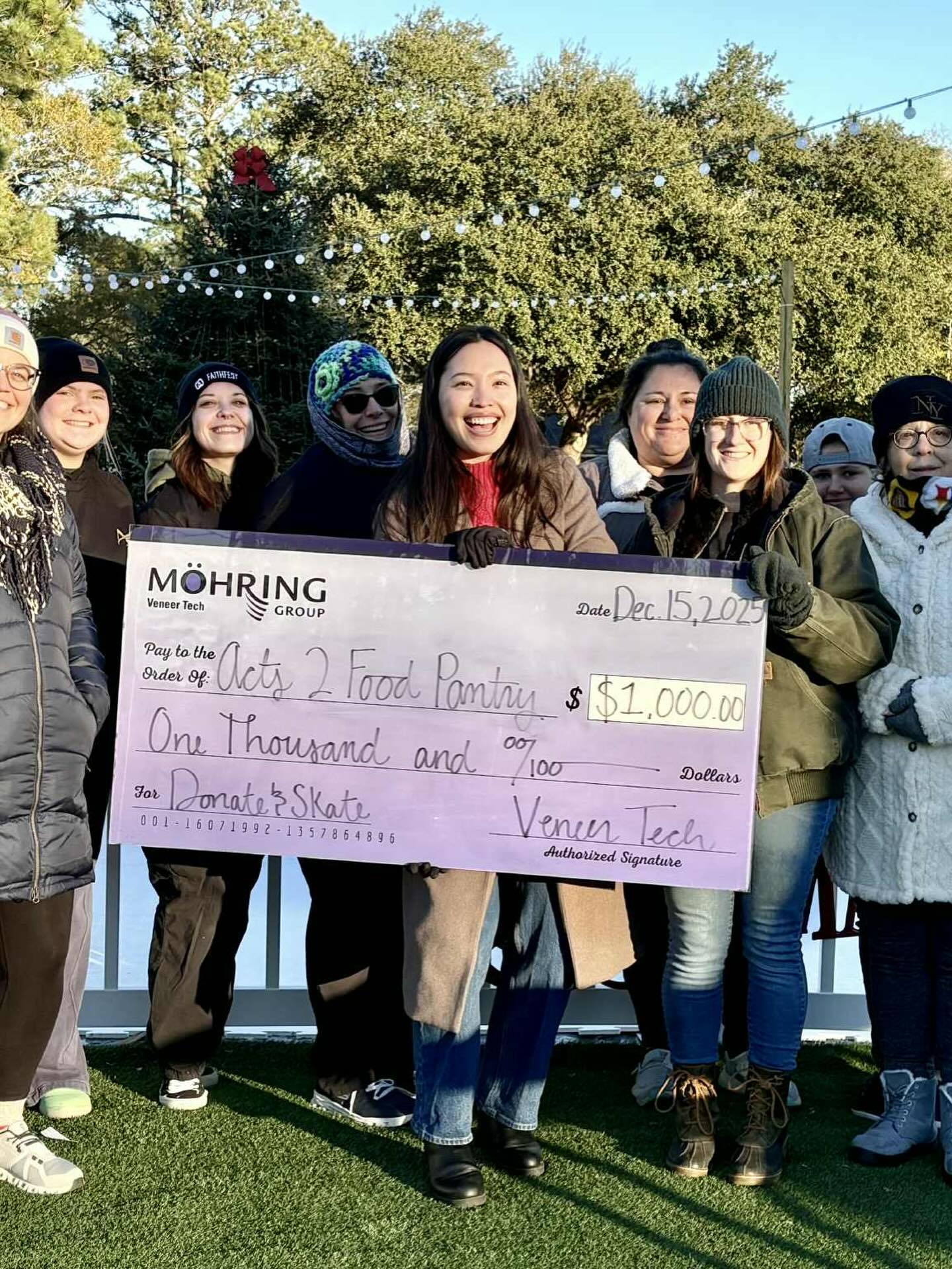 Graham Memorial PHC members demonstrating gratitude to someone's generosity towards the community outreach in Newport, NC