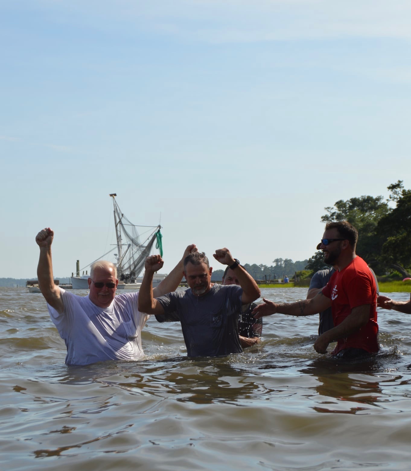 Graham Memorial PHC Newport River Baptism service in the Newport, NC, celebrating a person's public declaration of faith in Jesus Christ