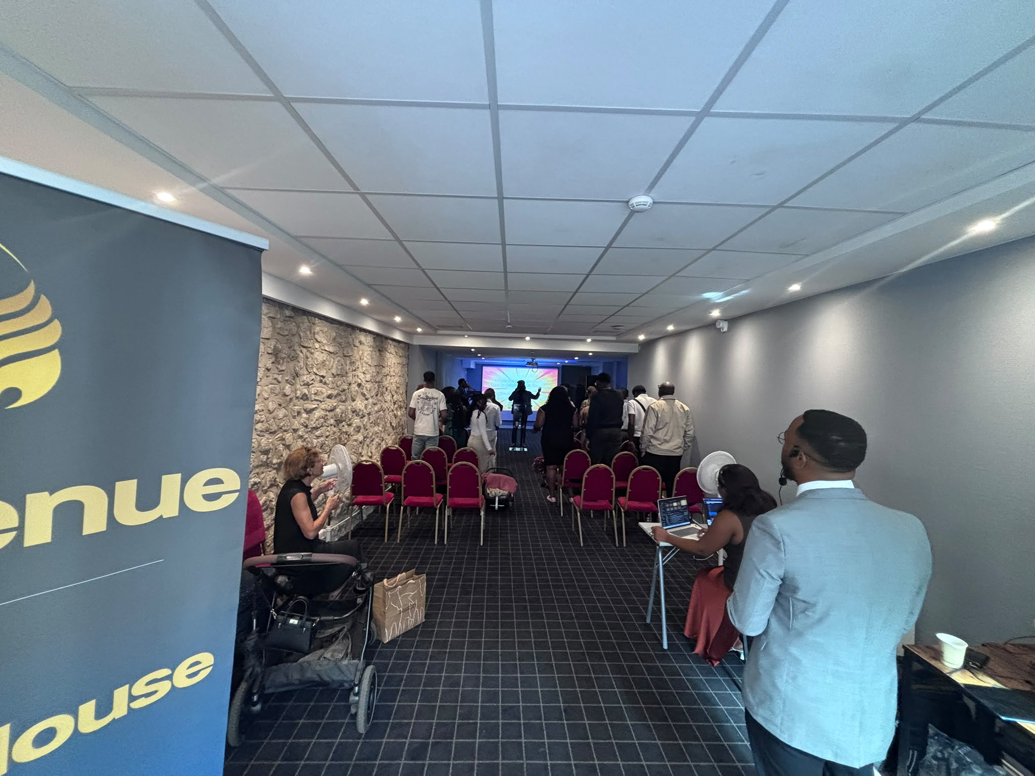 People gathered in the church hall at Potters House Paris.