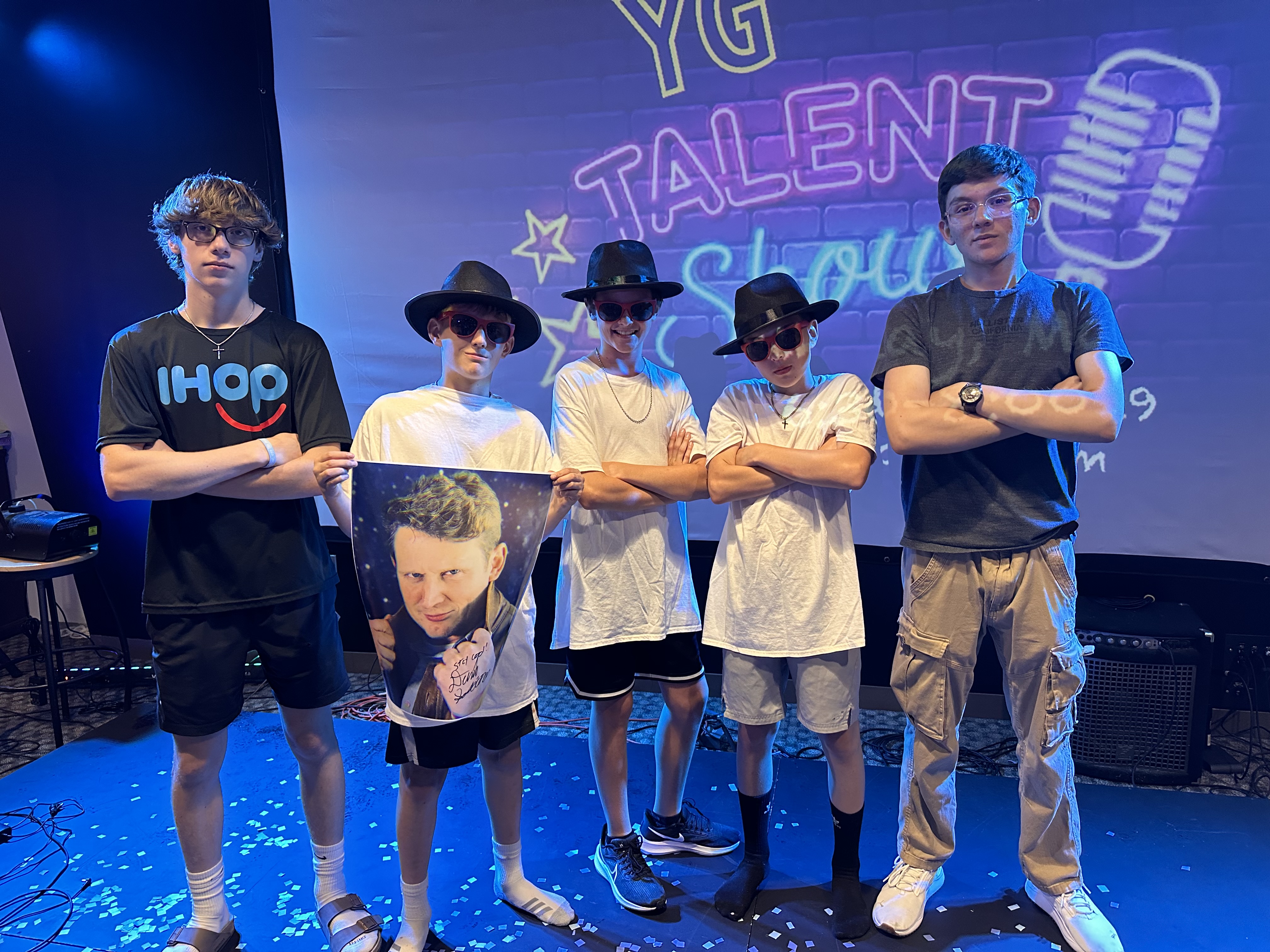 A talented young girl is coloring a page at the Easter craft station.