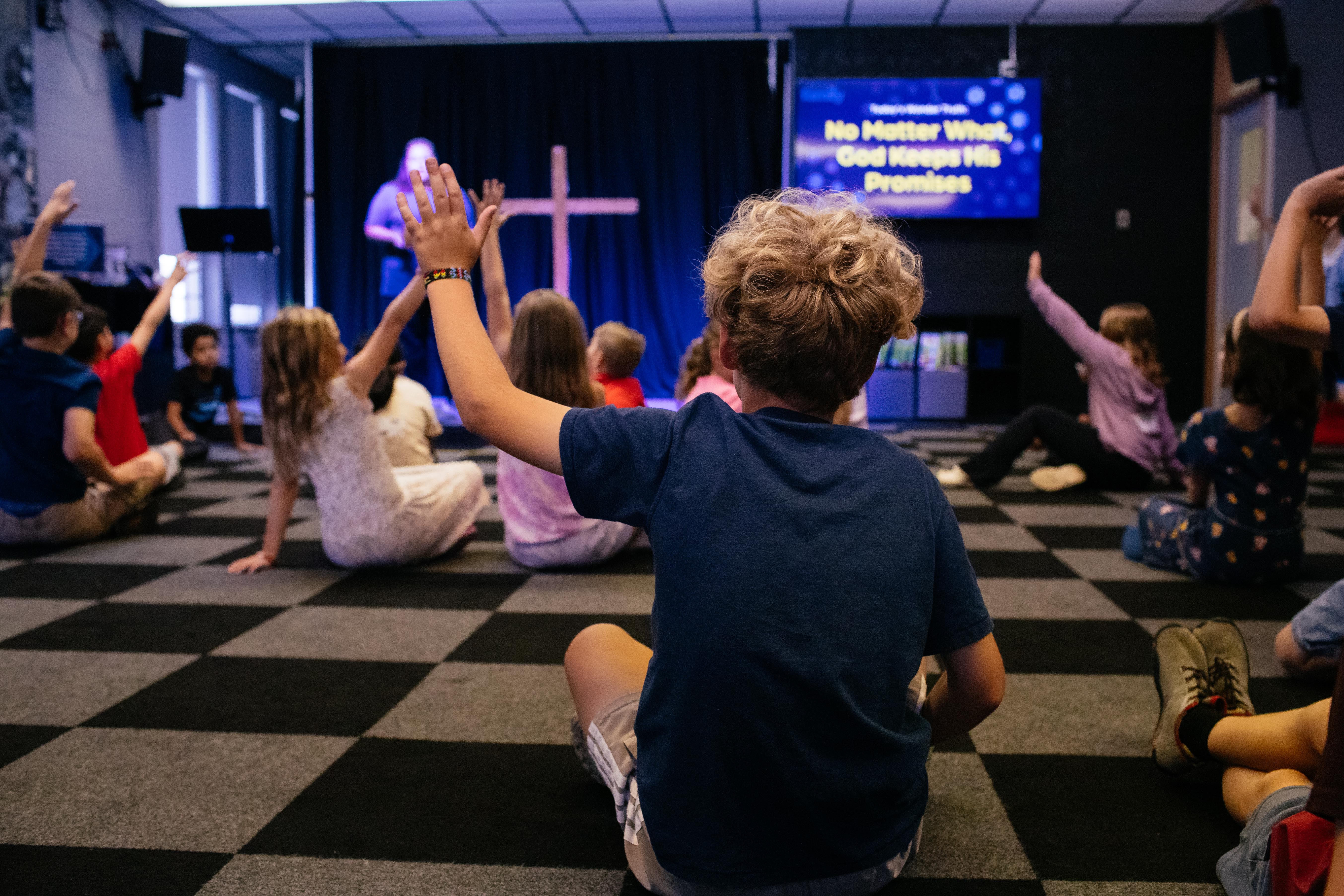 Kids worshipping in the Kids ministry at Branch Church, a non denominational church in Jefferson Park IL