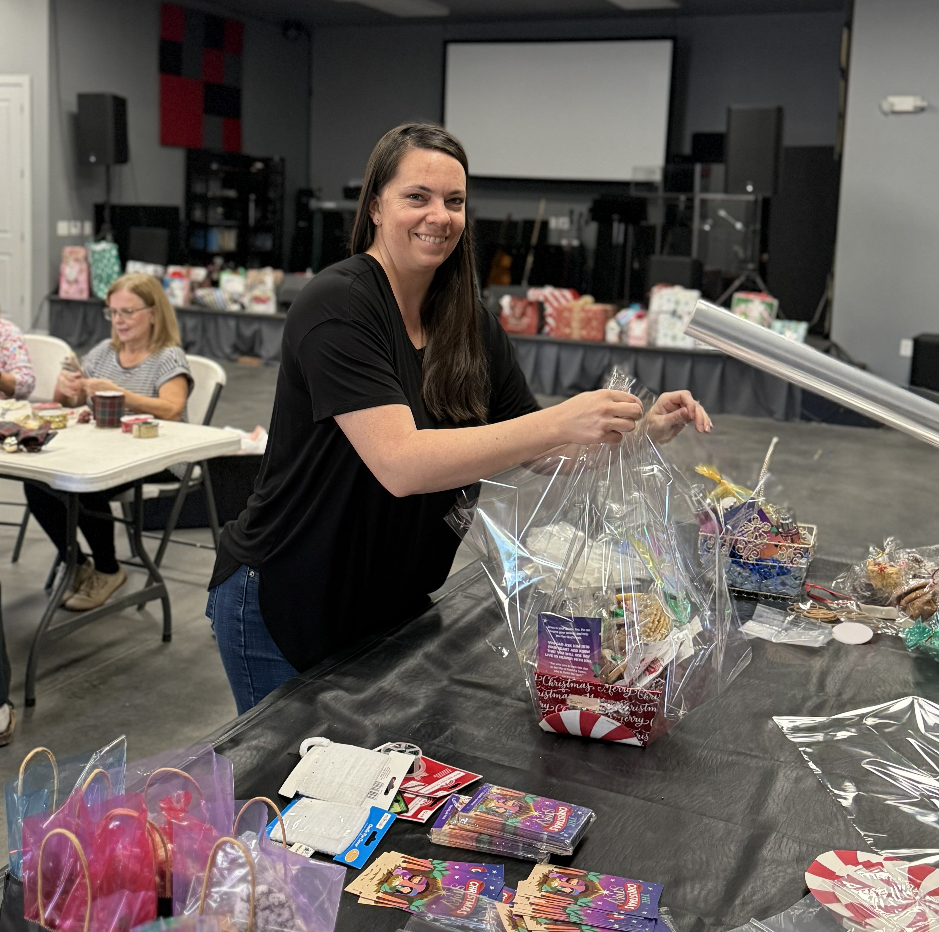 Nichole Adams wrapping a gift
